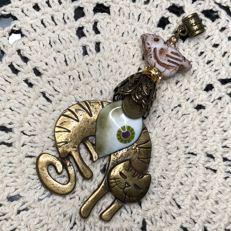 bronze cat, olive leaf, white bird necklace pendant