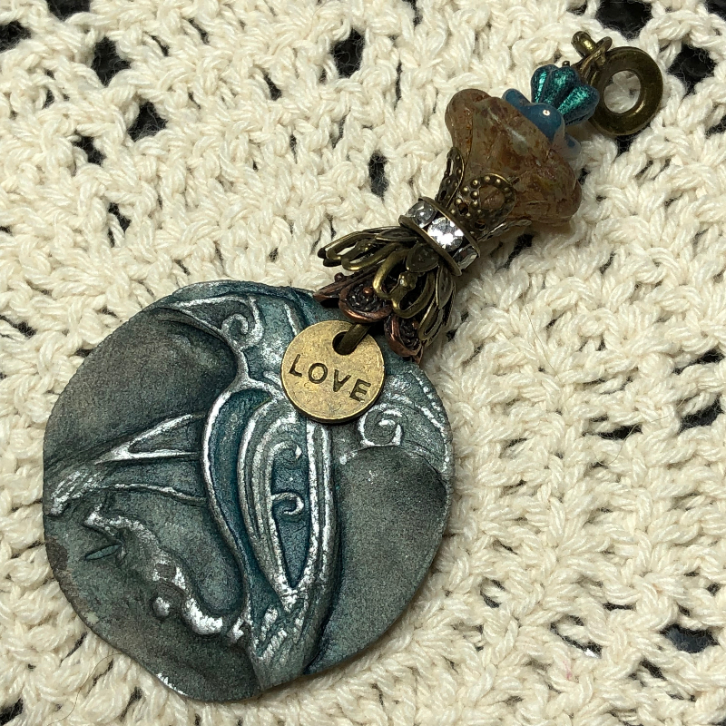 rustic urban raven kiln fired necklace pendant