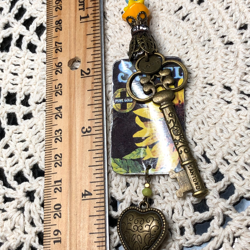 key to the heart of the midwest vintage sunflower tin necklace pendant