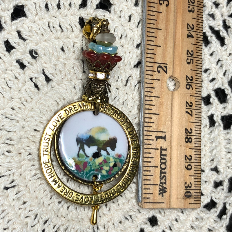 lineage of buffalo, enameled necklace pendant