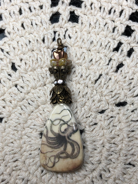 fleeting octopus, kiln fired necklace pendant