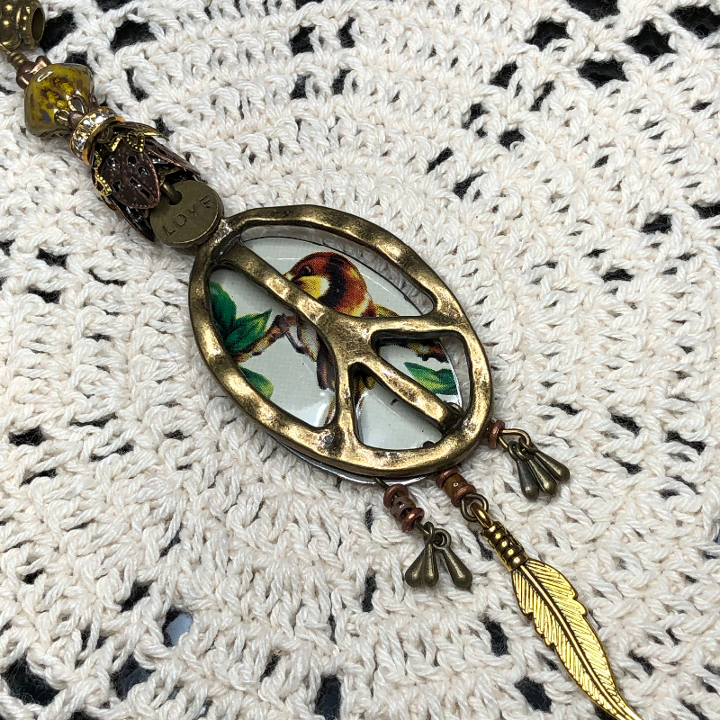 earth peace keeper vintage bird tin-necklace pendant