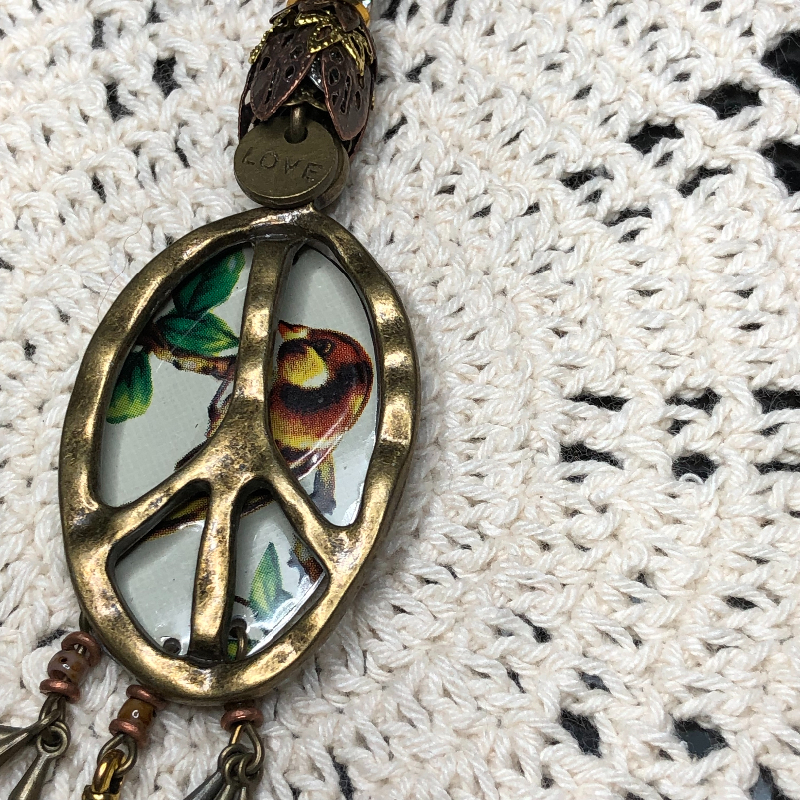 earth peace keeper vintage bird tin-necklace pendant