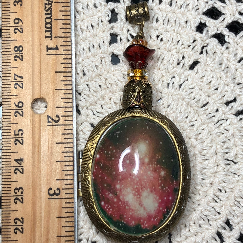 interstellar luminescent nebula, vintage locket necklace pendant