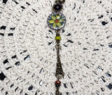 inner vision, enameled  flower necklace pendant