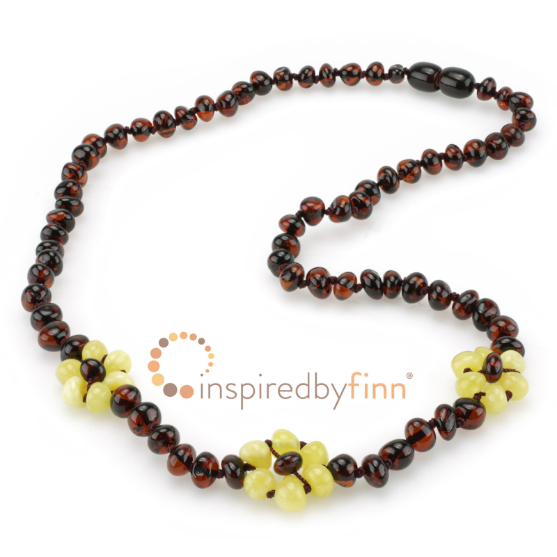 <u>Baltic Amber Adult/Adolescent Necklace - Polished White Flower</u>