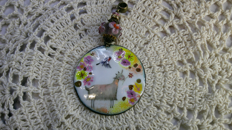 pendant-goat in the meadow