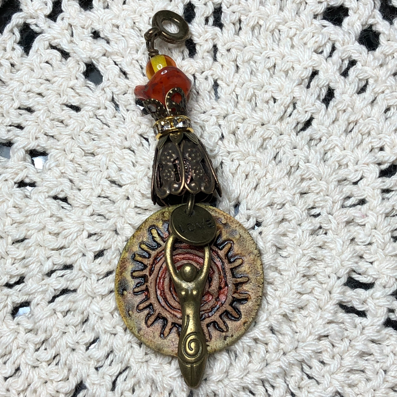 sun centered goddess kiln fired necklace pendant