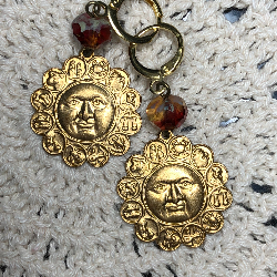 secrets the sun holds, golden earrings