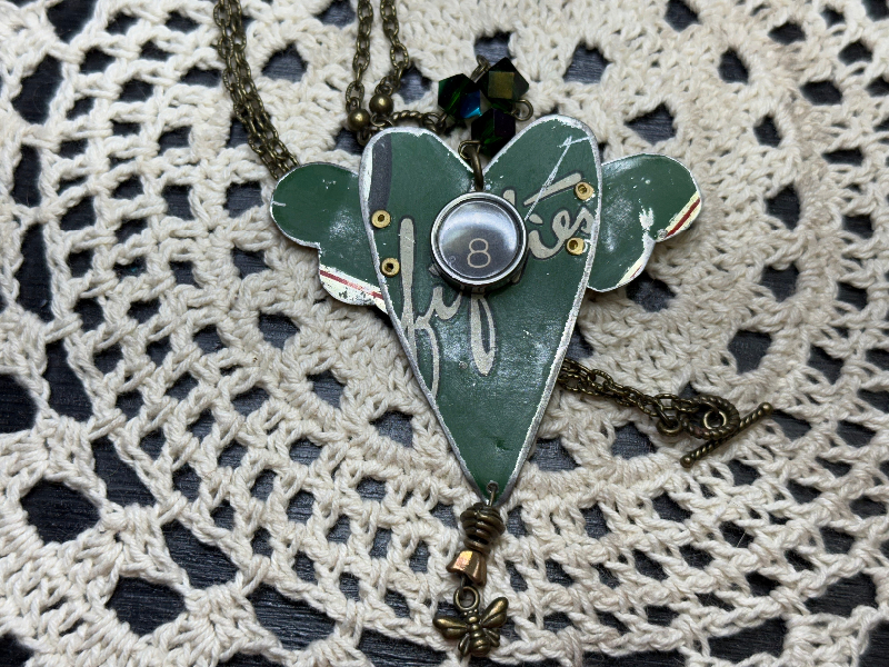 58 green winged heart vintage tin necklace