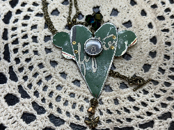 58 green winged heart vintage tin necklace