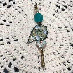 sacred spring flos enameled bird necklace pendant