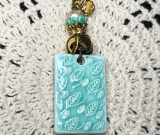 light turquoise, leaves falling, kiln fired estate vintage necklace pendant